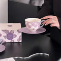 Elegant purple floral ceramic tea cup and saucer with gift box, perfect for tea sets or coffee lovers